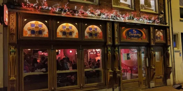 Inside De Dampkring Amsterdam – Unique Coffeeshop Interior with Artistic Vibes