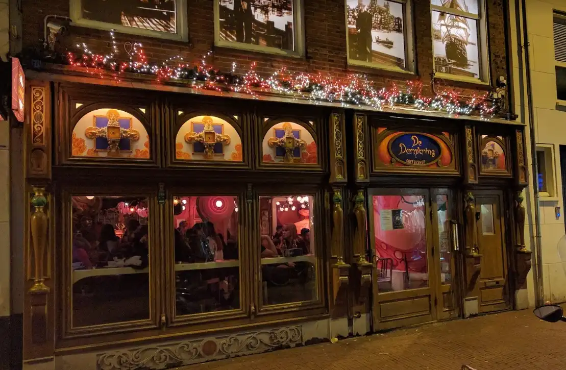 Inside De Dampkring Amsterdam – Unique Coffeeshop Interior with Artistic Vibes